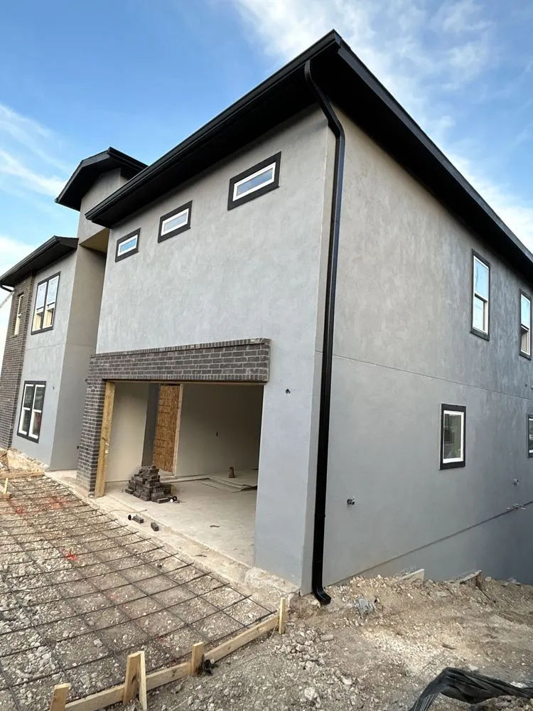 Slide of Gonzalez Seamless Rain Gutters