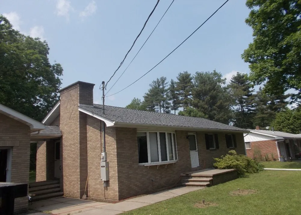 Slide of Gordon Healey Roofing