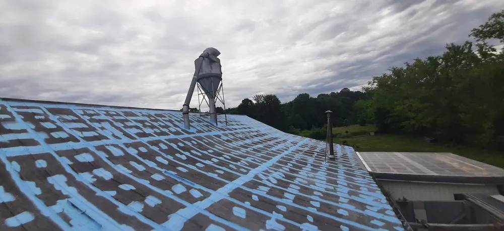 Slide of Gordon's Roof Restoration