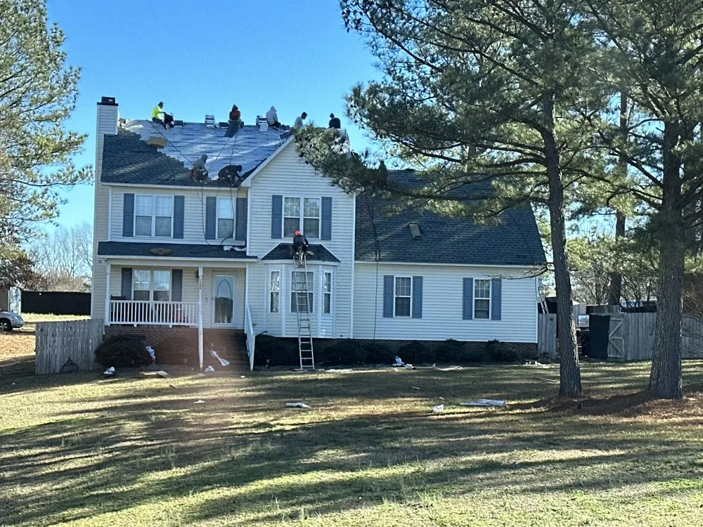 Slide of Gowan Roofing