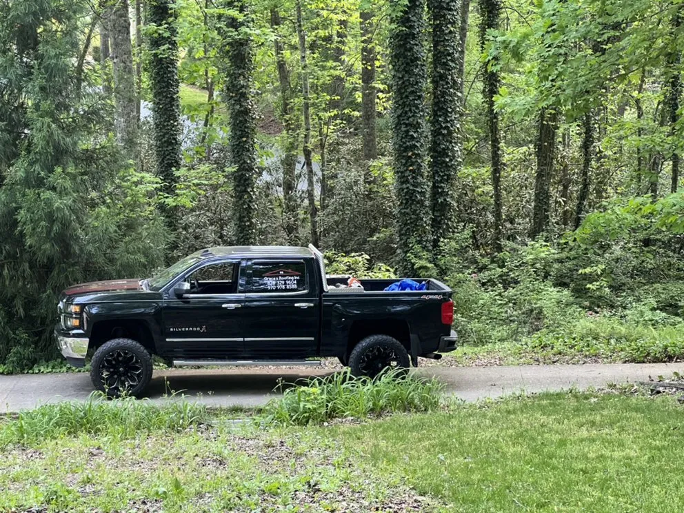 Slide of Grace’s Roofing