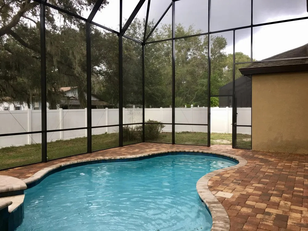 Local storm damage roof repair after storm damage in Lithia, FL by Graco Construction