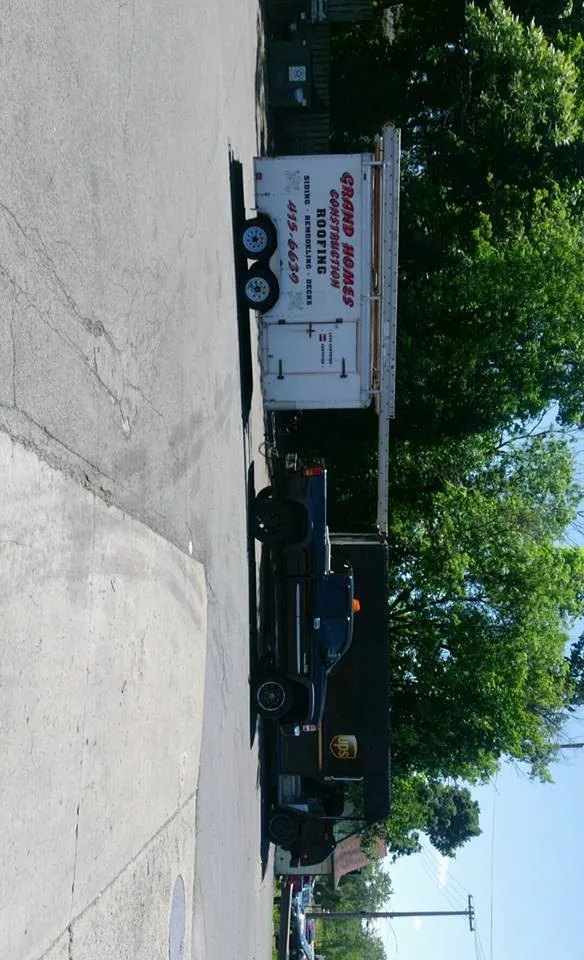 Slide of Grand Homes Roofing