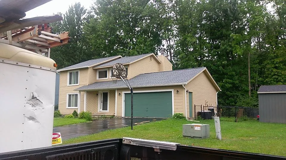 Slide of Grand Homes Roofing