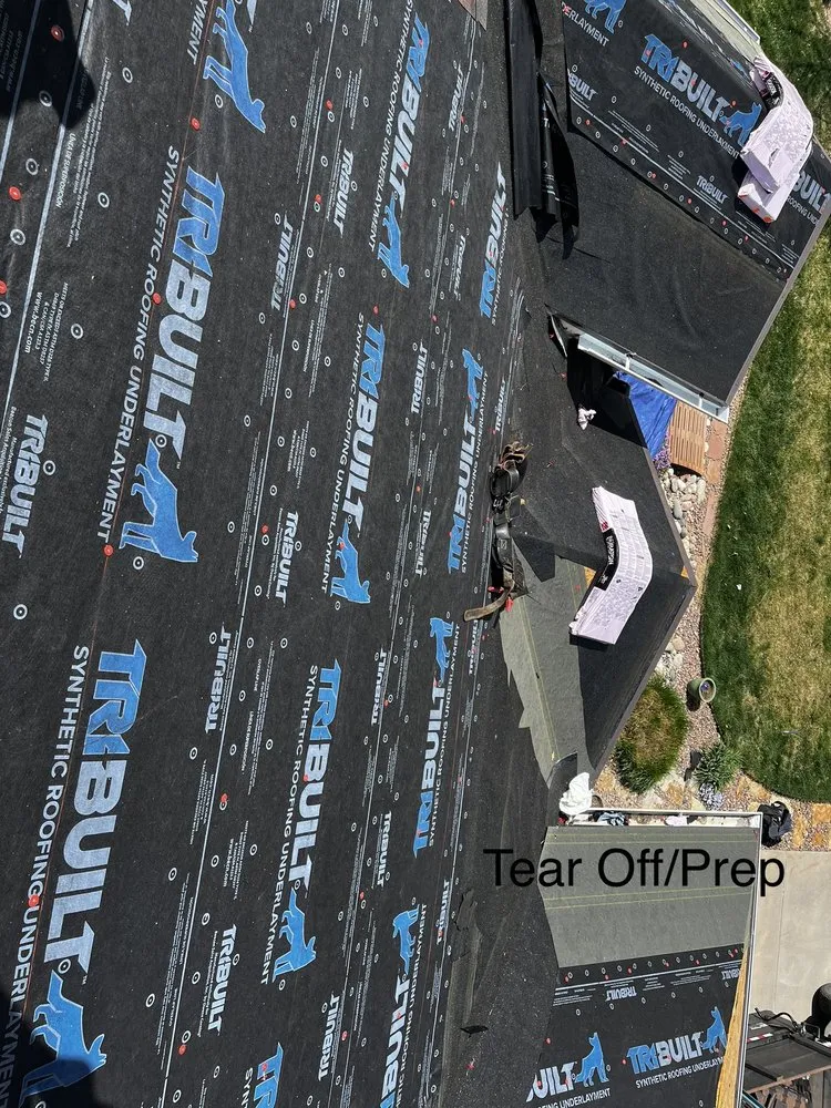 Slide of Grand Line Roofing