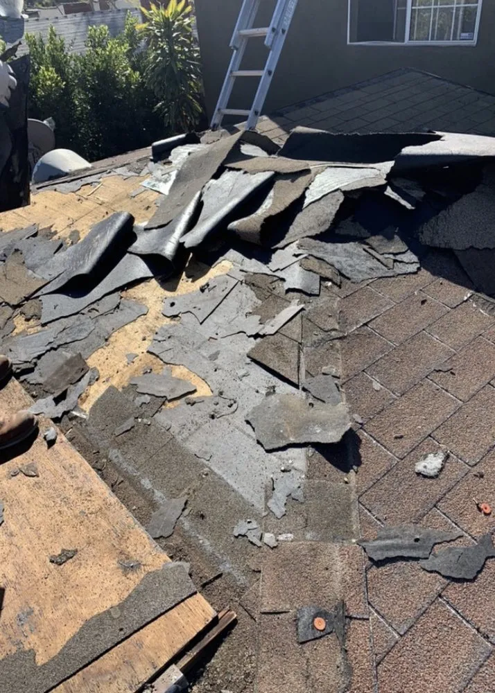 Slide of Grand Roofing Contractor