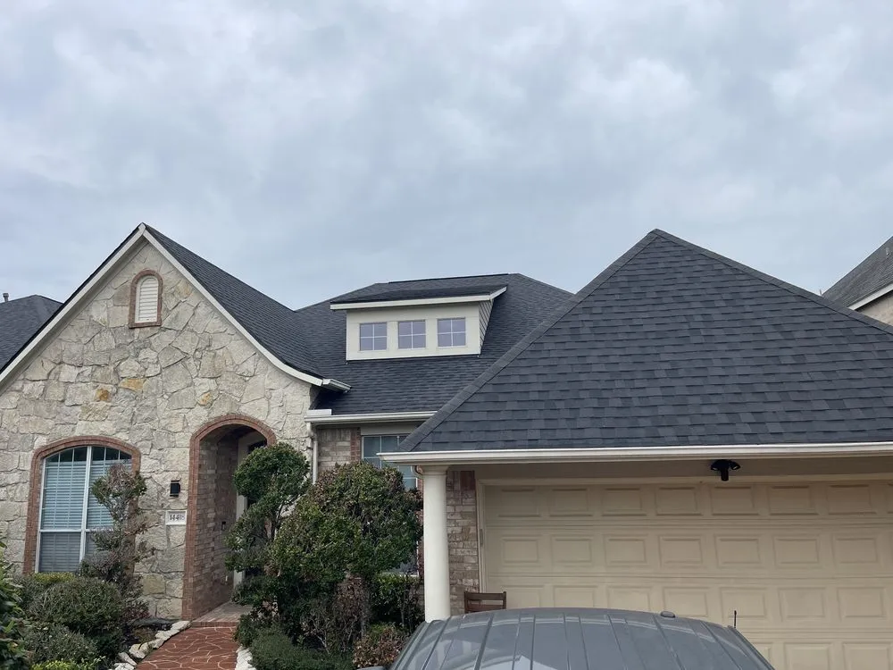 Slide of Grand Roofing