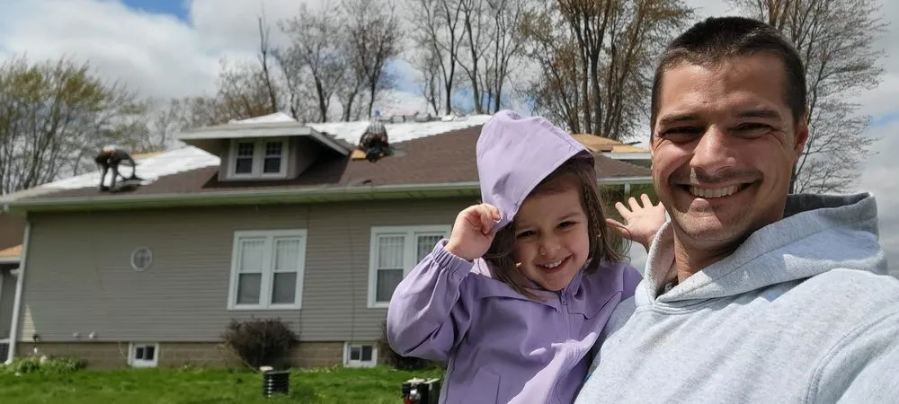 Slide of Grand Roofing