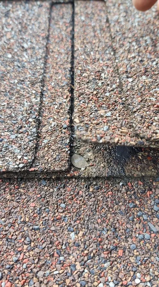 Slide of Grand Roofing