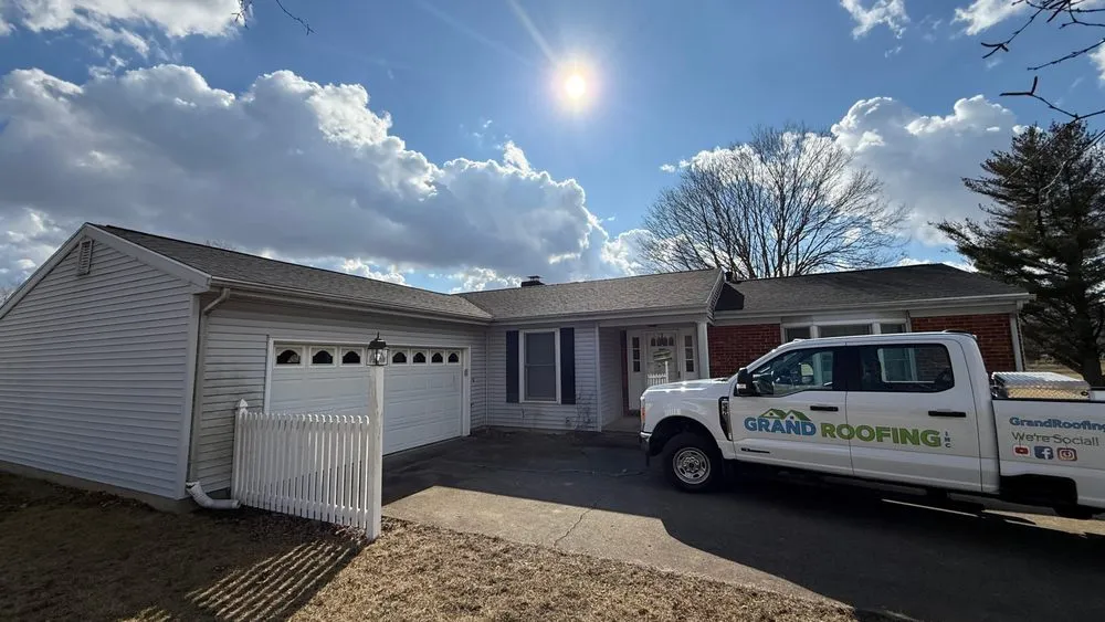 Slide of Grand Roofing
