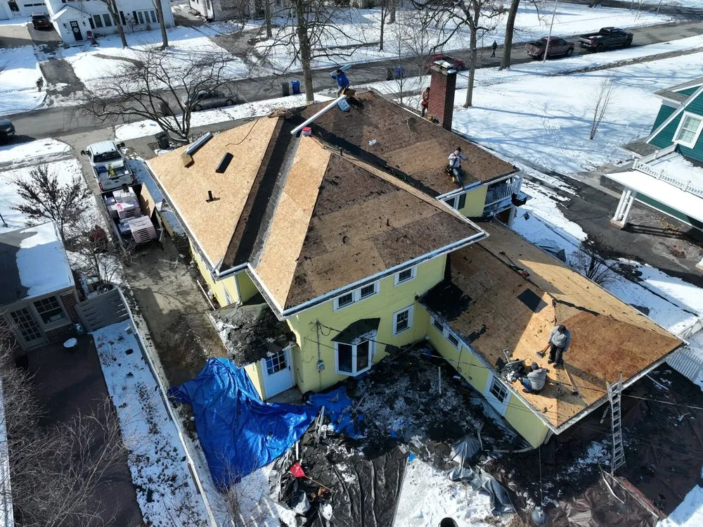 Slide of Grand Roofing