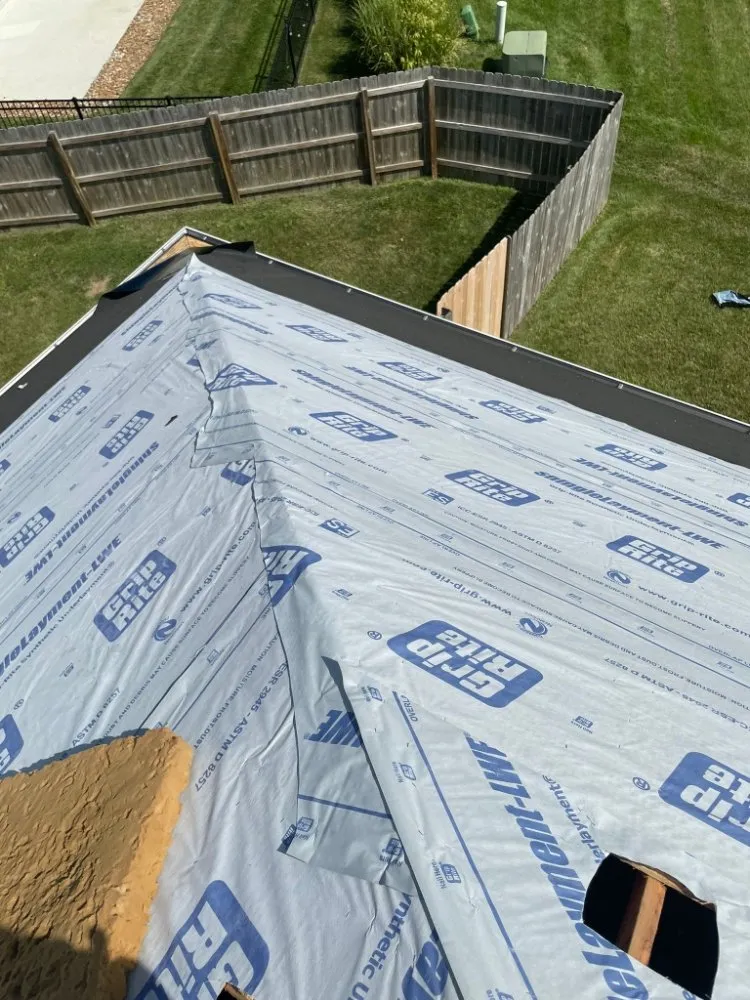 Slide of Grand Street Roofing