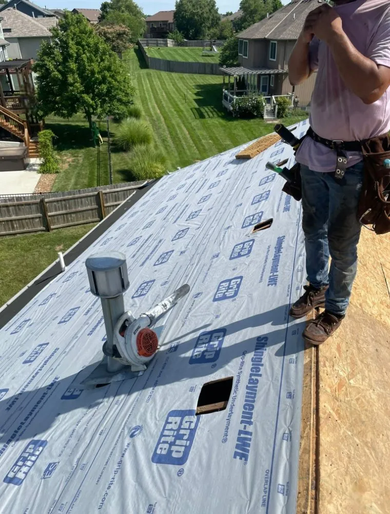 Slide of Grand Street Roofing