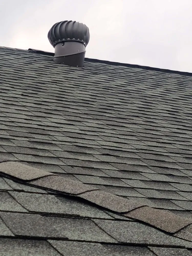 Slide of Grasshopper Roofing