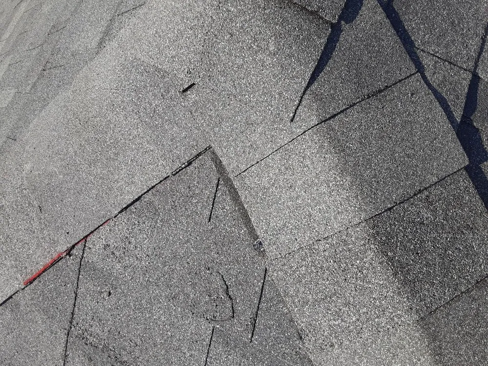 Slide of Grassi Roofing