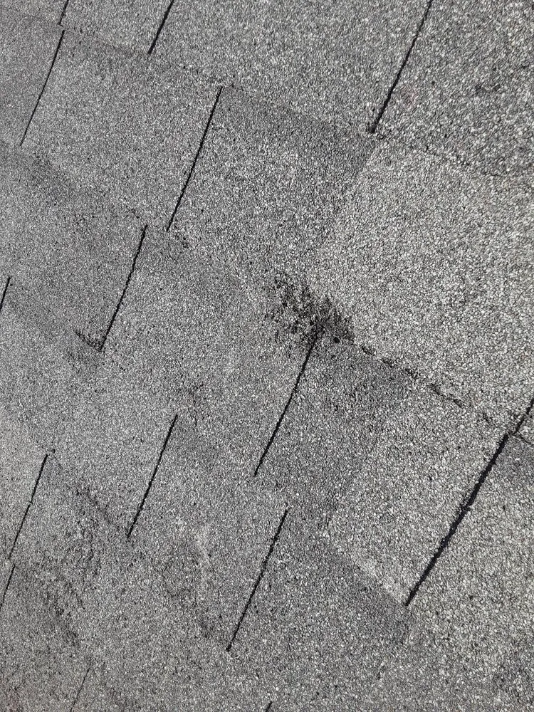 Slide of Grassi Roofing