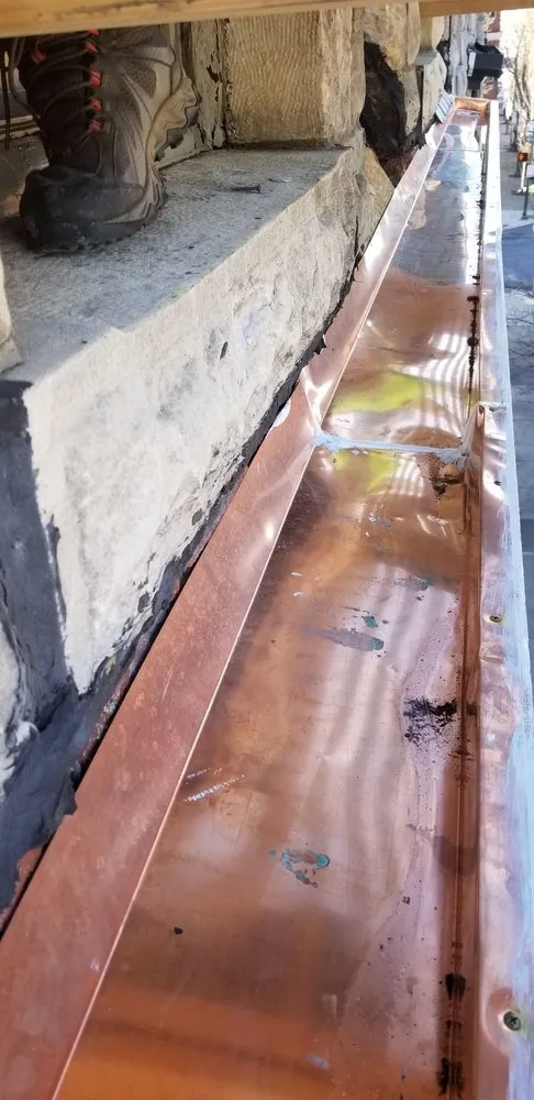 Slide of Great American Gutter & Painting