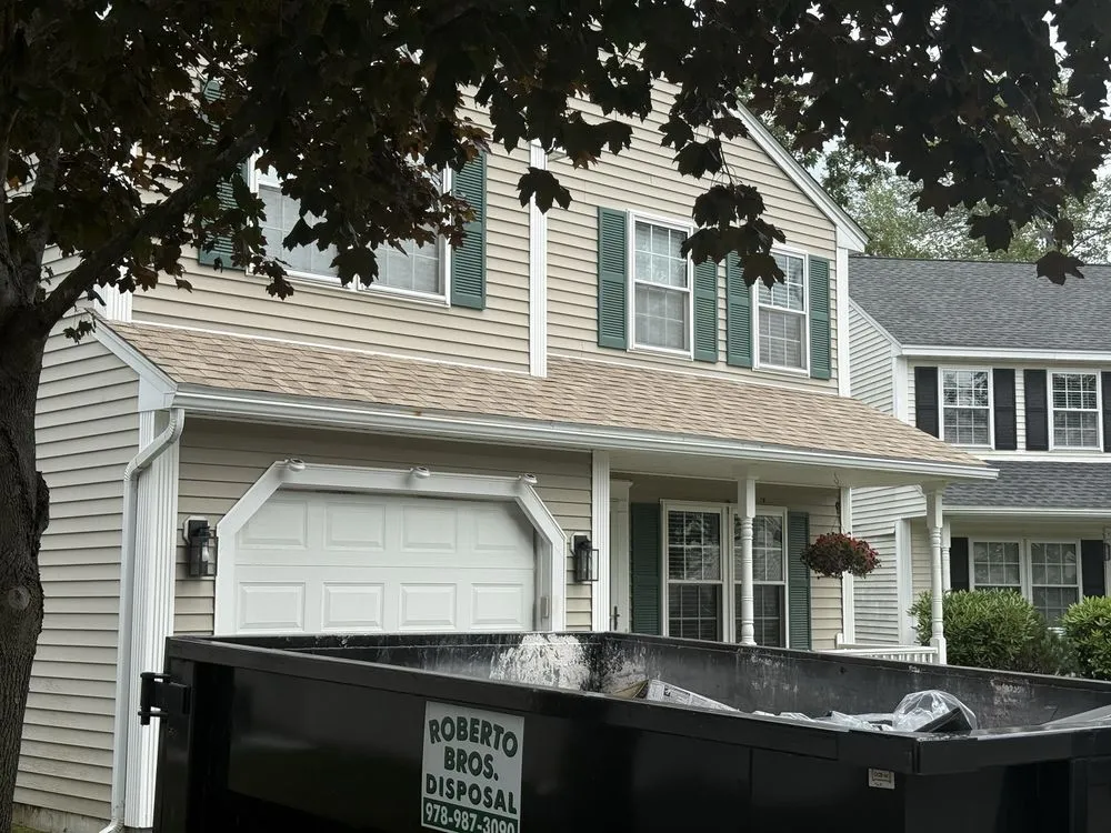 Slide of Greater Boston Roofing