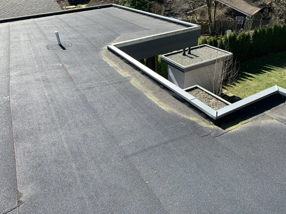 Slide of Greater Seattle roofing and construction