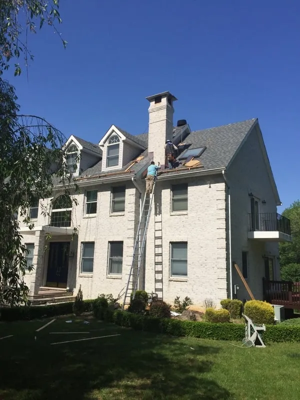 Slide of Green Apple Roofing