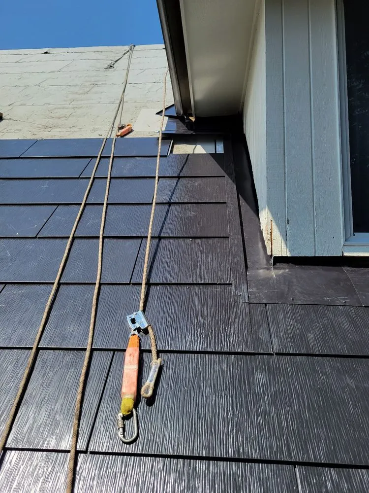 Slide of Green Attic Roofing