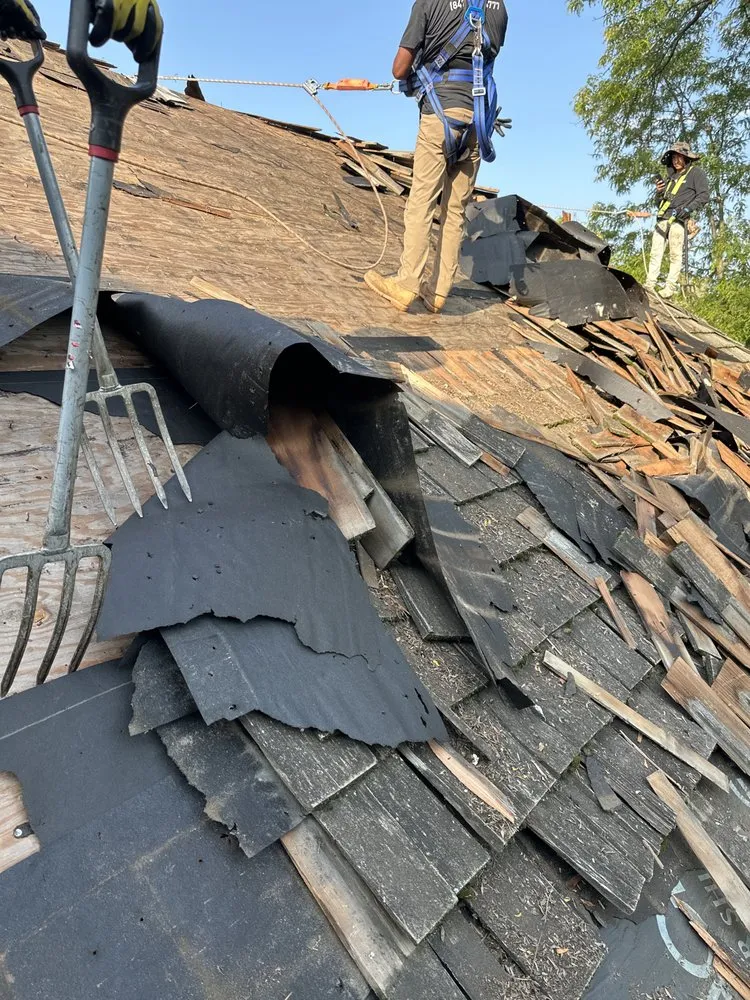 Slide of Green Attic Roofing