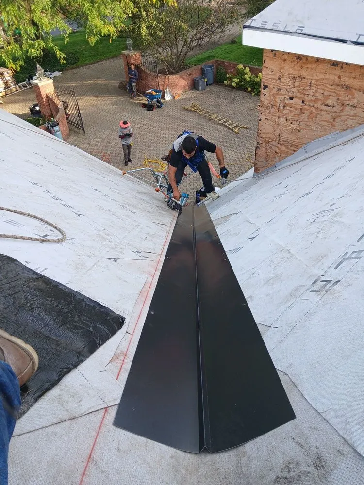 Slide of Green Attic Roofing