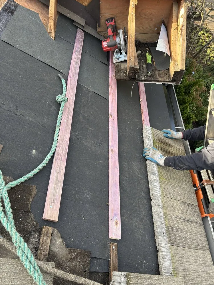 Slide of Green City Roofing