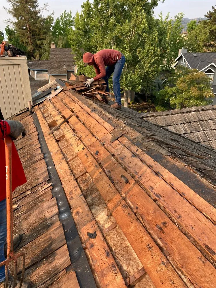 Slide of Green Group Roofing