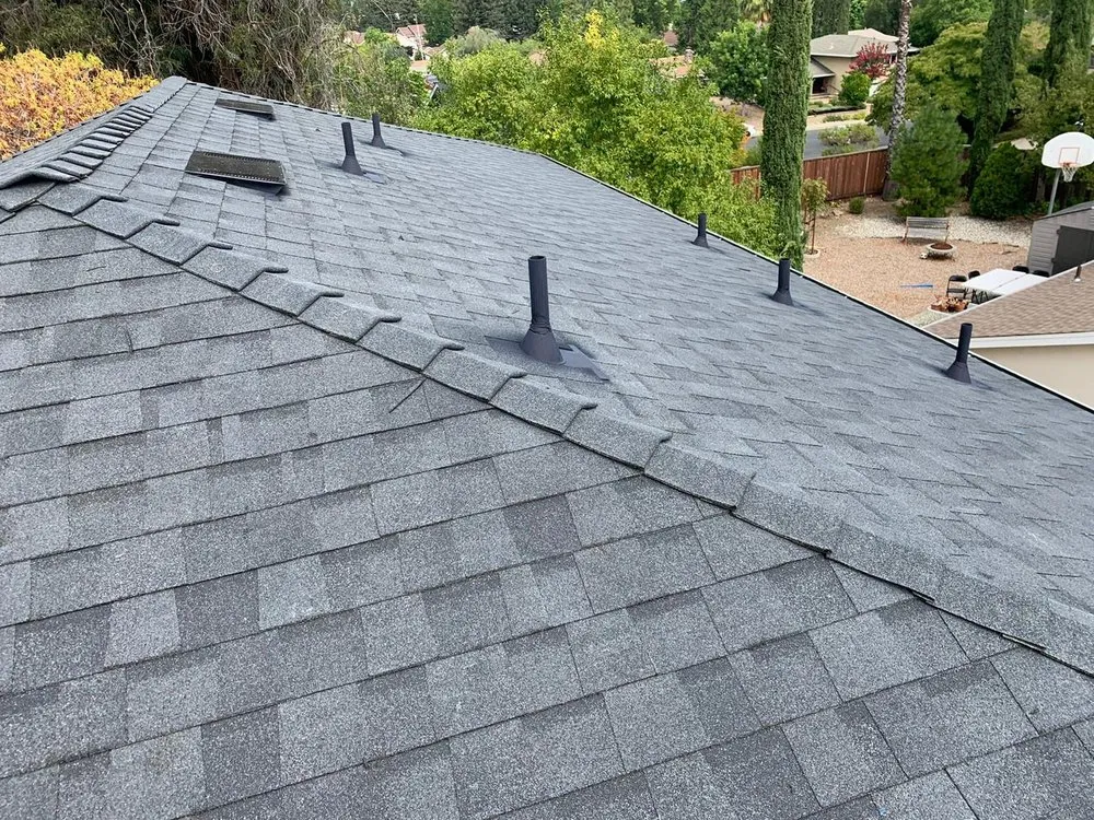 Slide of Green Group Roofing
