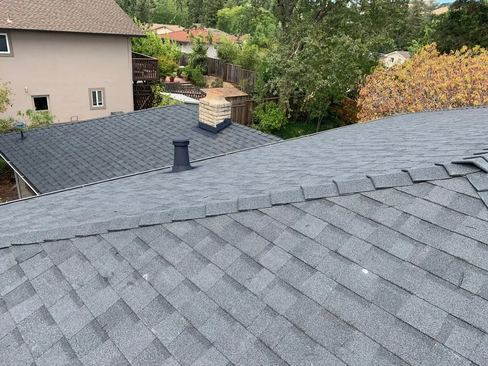 Slide of Green Group Roofing