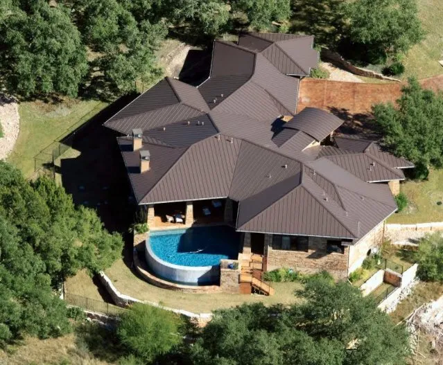 Slide of Green Knight Metal Roofing