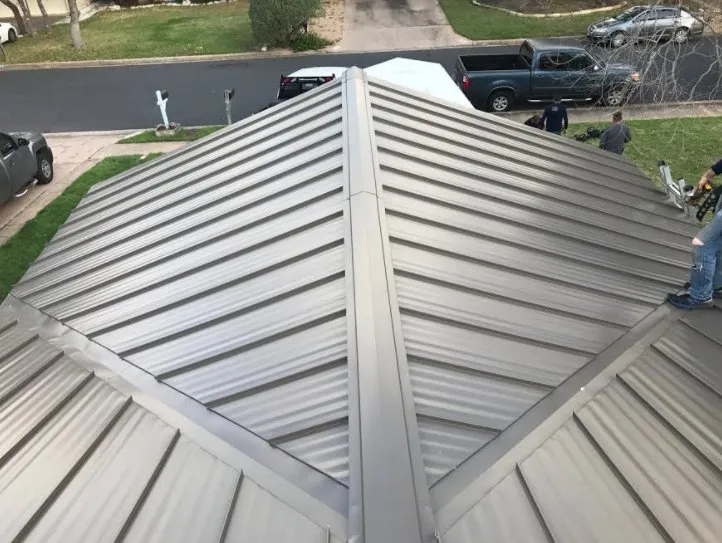 Slide of Green Knight Metal Roofing