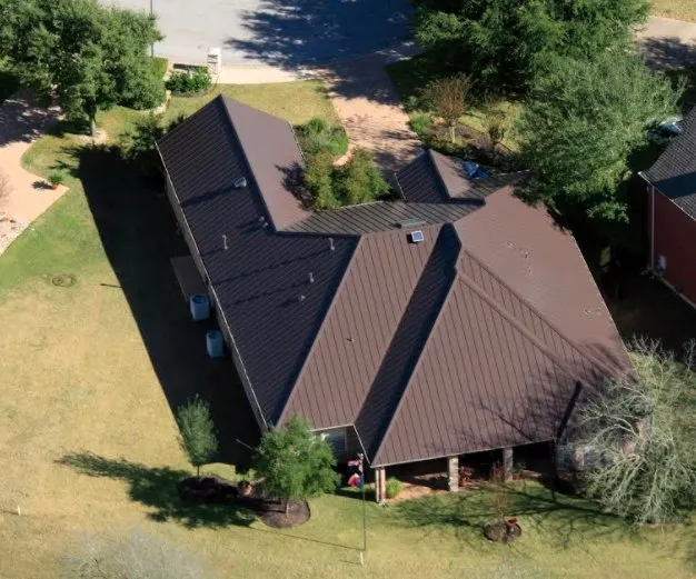 Slide of Green Knight Metal Roofing