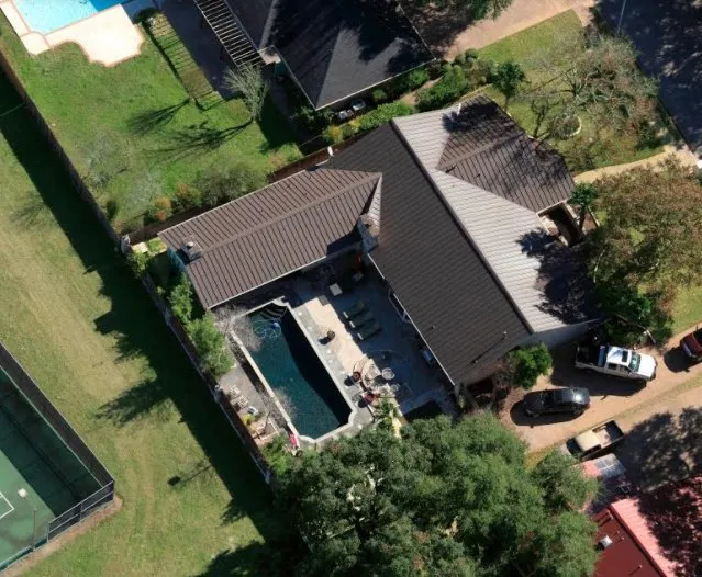 Slide of Green Knight Metal Roofing