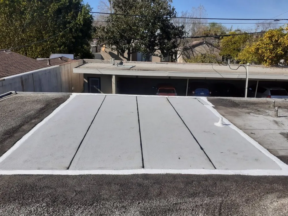 Slide of Green Ladder Roofing