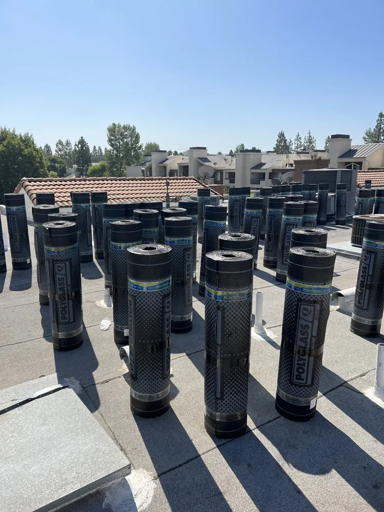 Slide of Green Ladder Roofing