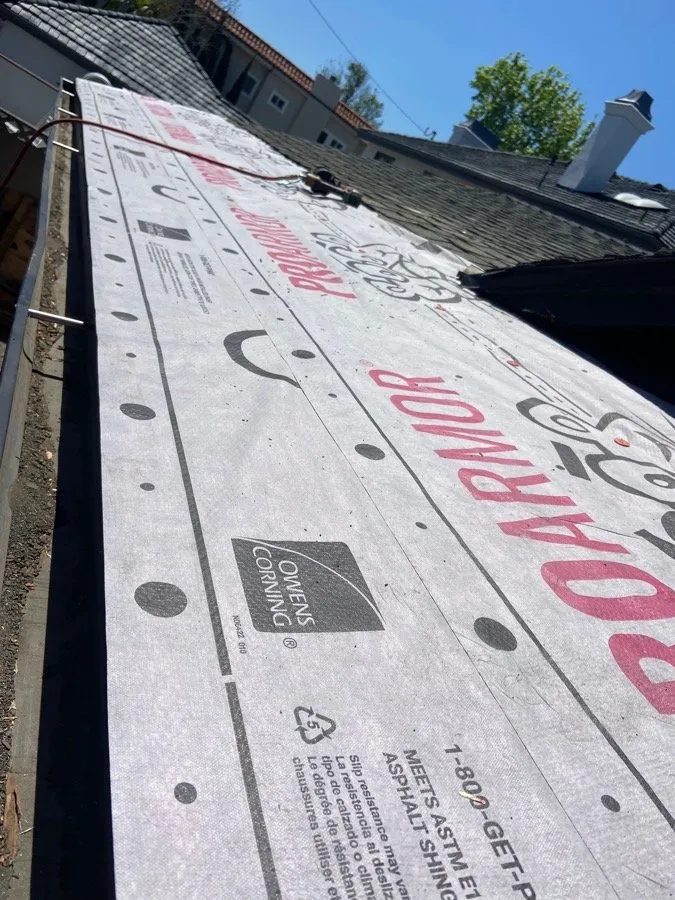 Slide of Green Leaf Roofers