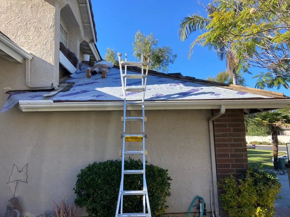 Slide of Green Leaf Roofers