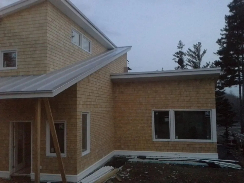 Slide of Green Leaf Roofing