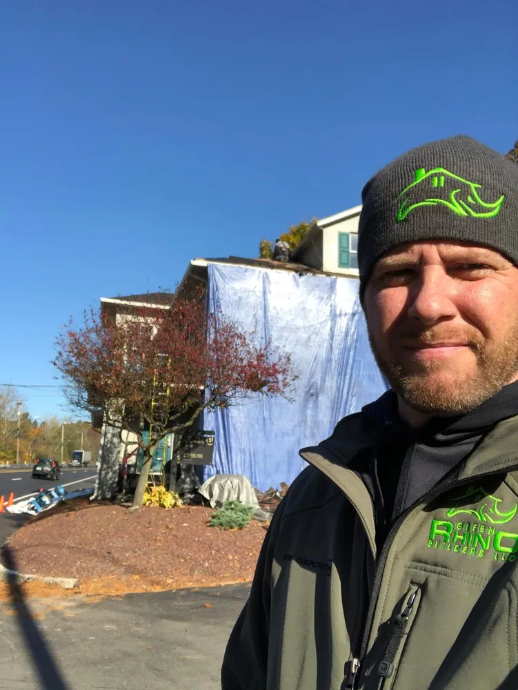 Slide of Green Rhino Roofing and Siding