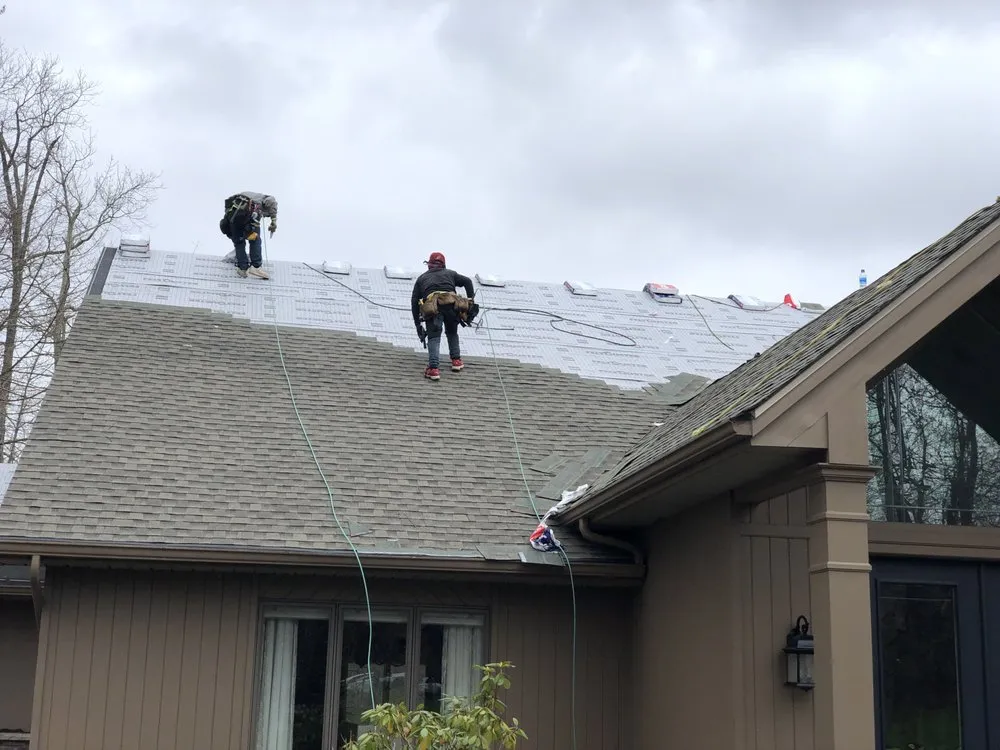 Slide of Green Rhino Roofing and Siding