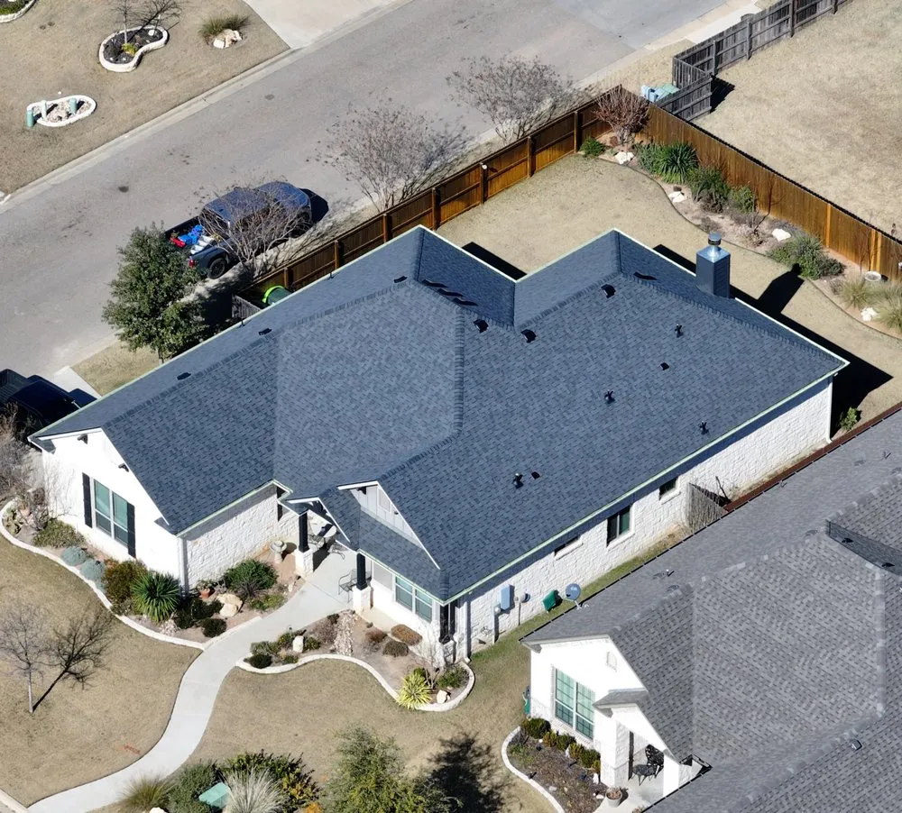 Slide of Green Shield Roofing