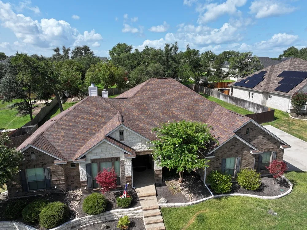 Slide of Green Shield Roofing