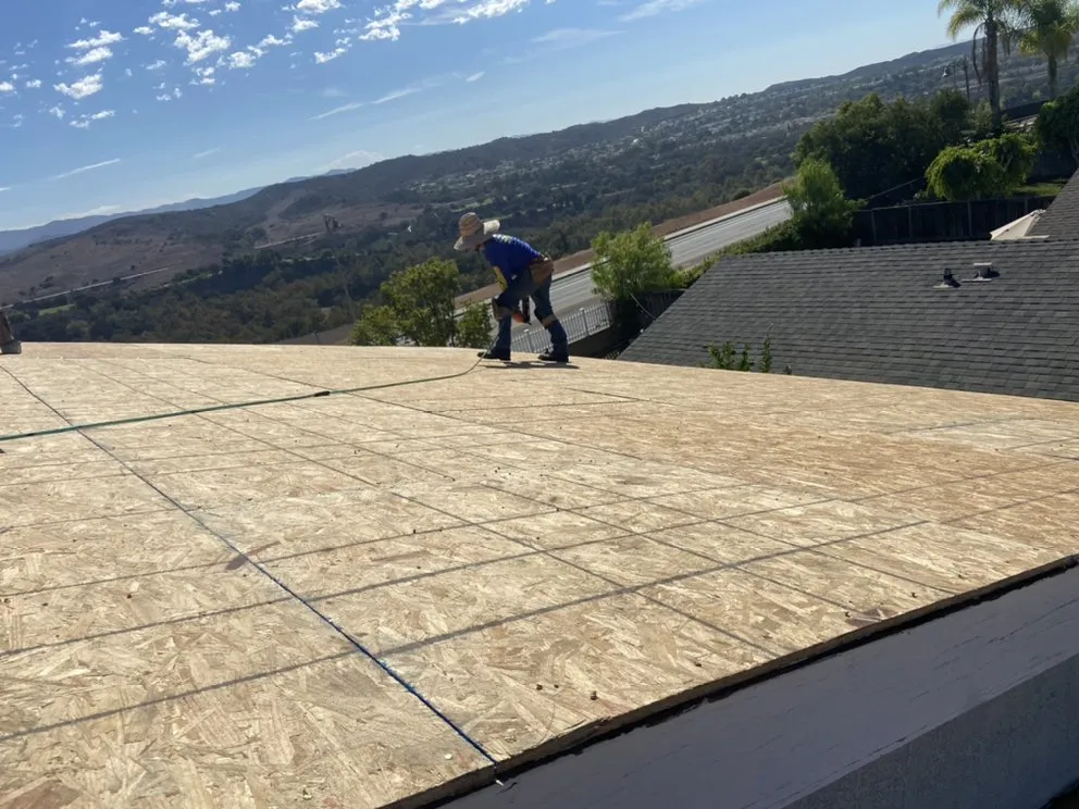Slide of Green Shield Roofing