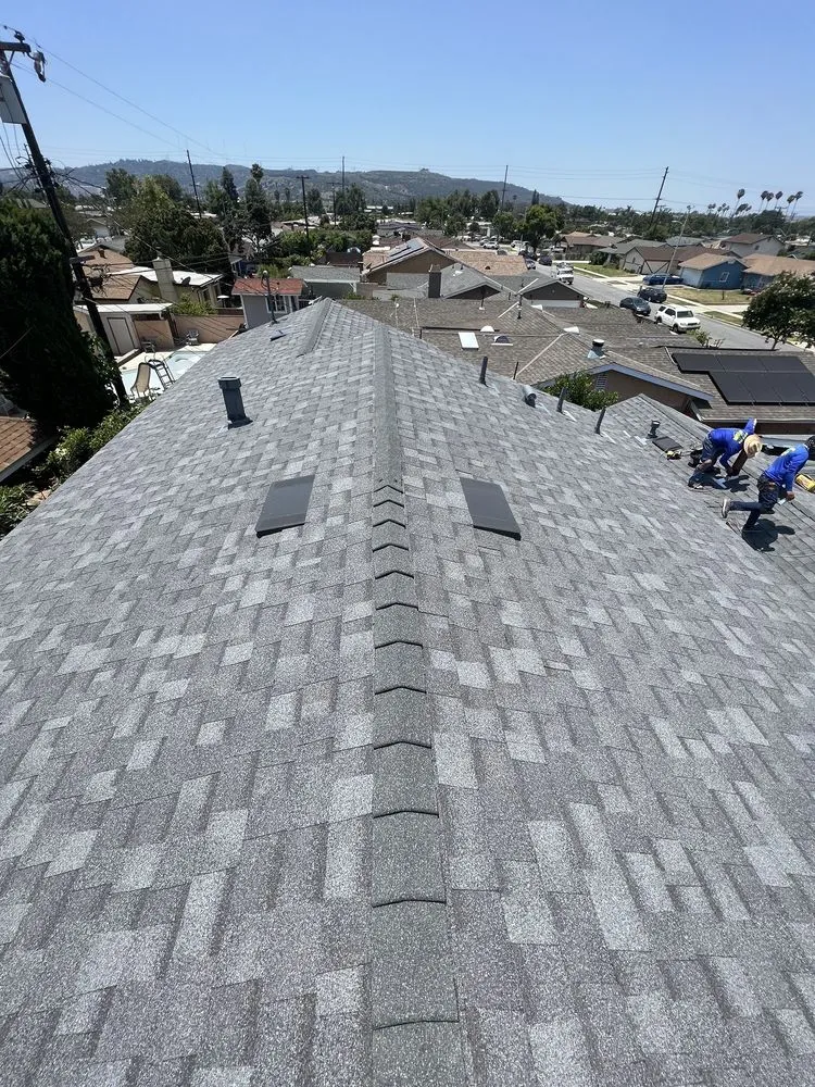 Slide of Green Shield Roofing