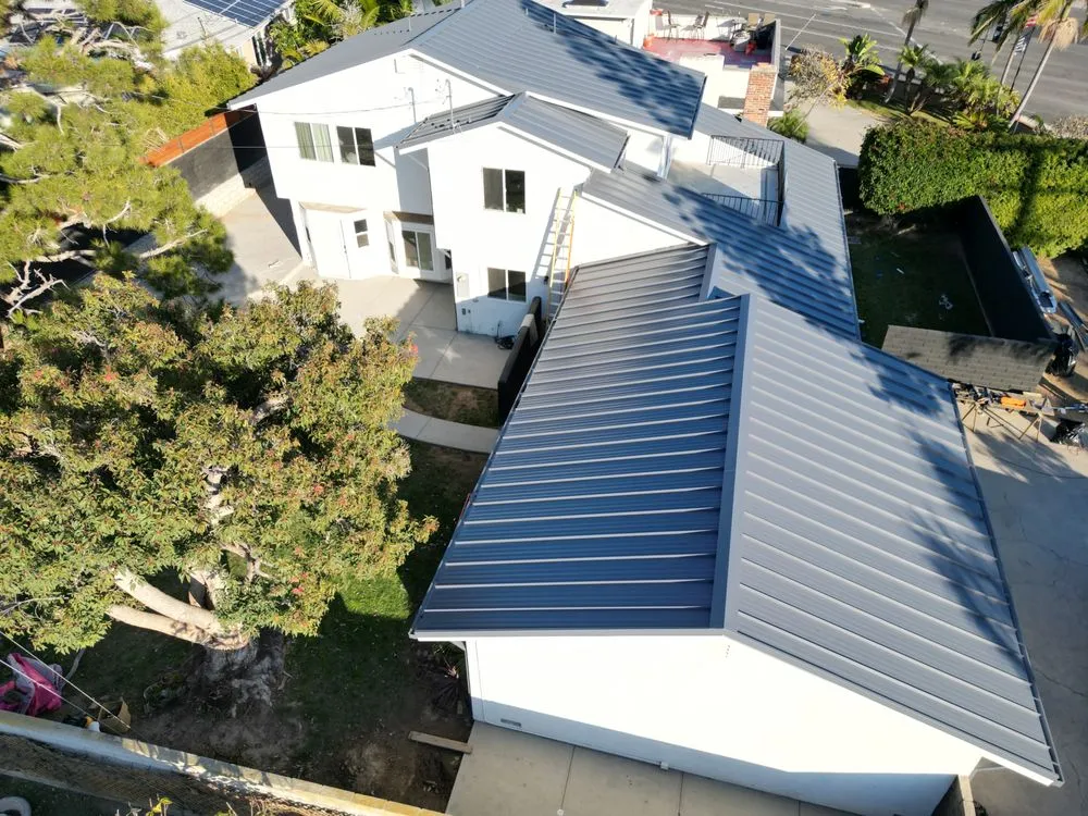 Slide of Green Shield Roofing