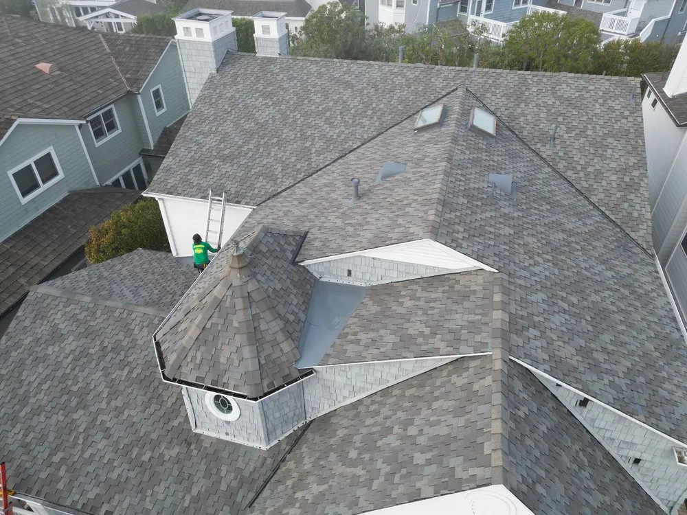 Slide of Green Shield Roofing