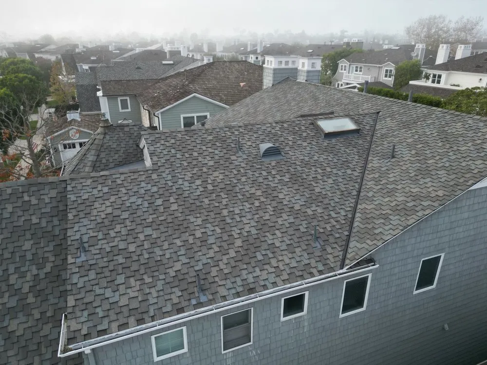 Slide of Green Shield Roofing