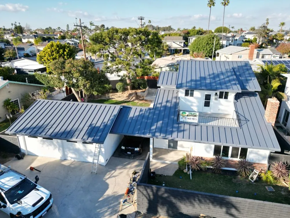 Slide of Green Shield Roofing